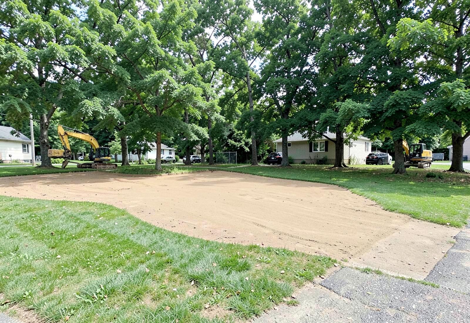 Finished graded lawn and improved property in New England